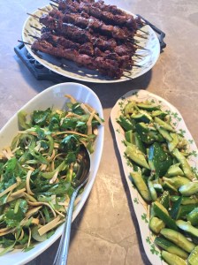 Beijing street food: lamb kebabs (Yangrou Chuanr) and tiger salad (laohu cai)